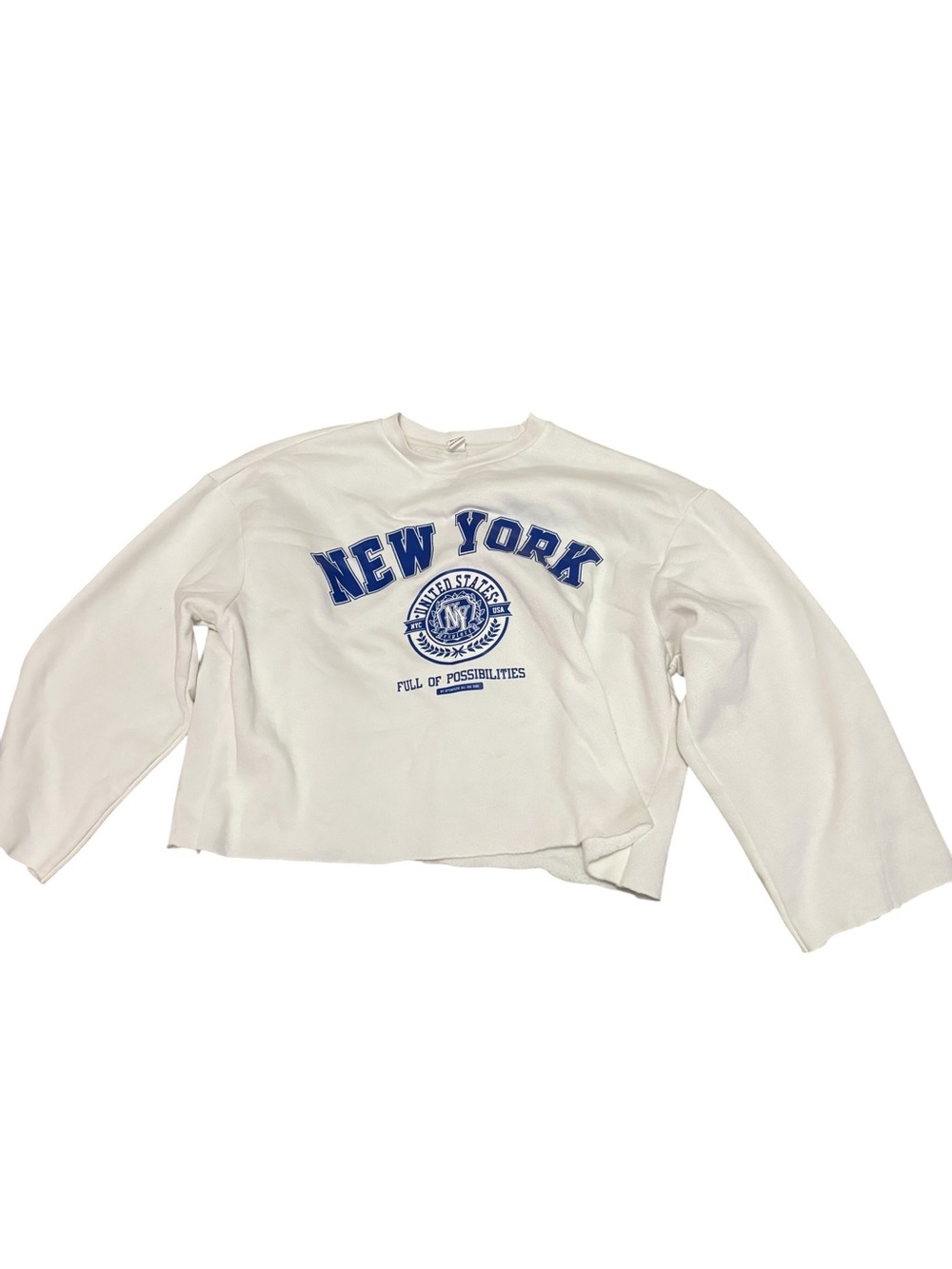 White Cropped Crewneck Sweater with Blue 'New York' Graphic